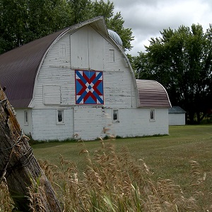 White barn with barn quilt in Central MN
